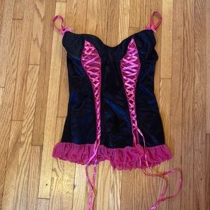 Sexy lacy pink and black corset with ruffle bottom